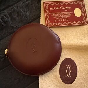 Cartier Must de Cartier Round Burgundy Leather Pouch